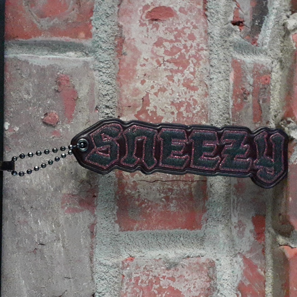 Coach x Disney Sneezy Keychain
